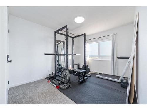 664 Seton Circle Se Circle Se, Calgary, AB - Indoor Photo Showing Gym Room