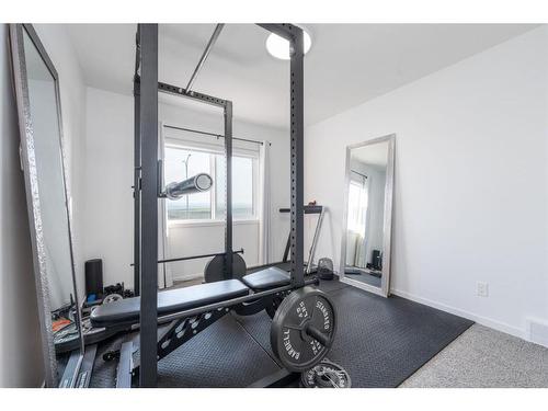 664 Seton Circle Se Circle Se, Calgary, AB - Indoor Photo Showing Gym Room