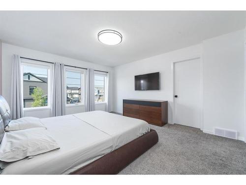 664 Seton Circle Se Circle Se, Calgary, AB - Indoor Photo Showing Bedroom