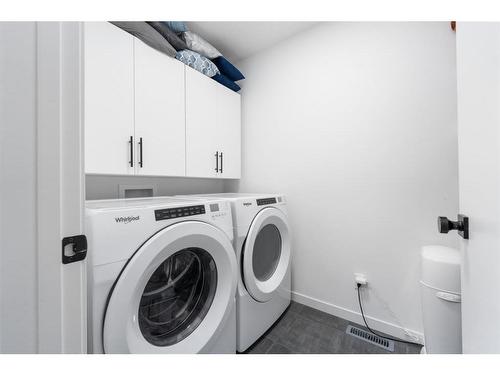 664 Seton Circle Se Circle Se, Calgary, AB - Indoor Photo Showing Laundry Room