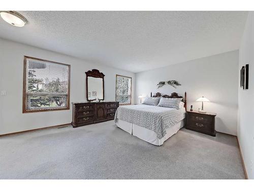 170 Woodpark Circle Sw, Calgary, AB - Indoor Photo Showing Bedroom