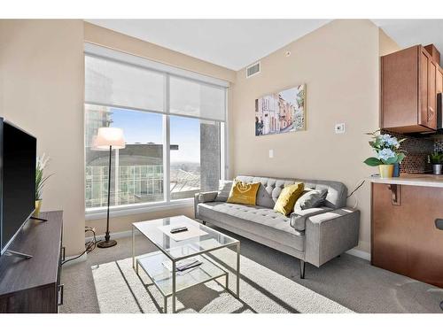 2702-1320 1 Street Se, Calgary, AB - Indoor Photo Showing Living Room