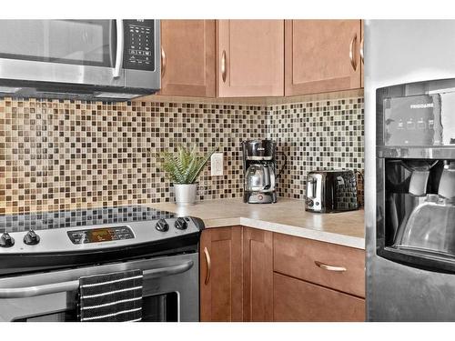 2702-1320 1 Street Se, Calgary, AB - Indoor Photo Showing Kitchen With Upgraded Kitchen