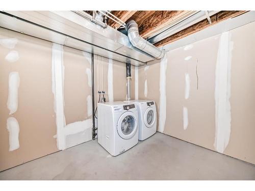 51 Aspen Hills Green Sw, Calgary, AB - Indoor Photo Showing Laundry Room