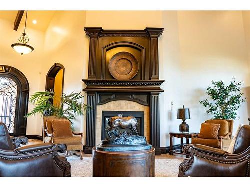 22-714040 Range Road 71, Grande Prairie, AB - Indoor Photo Showing Living Room With Fireplace