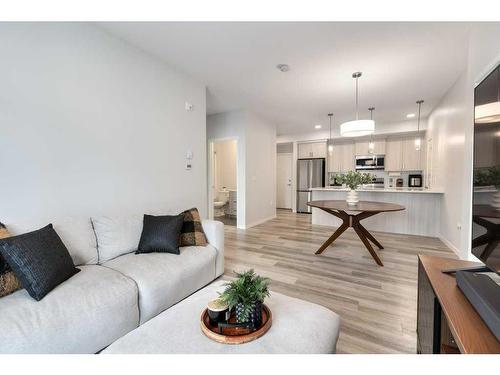 2209-220 Seton Grove Se, Calgary, AB - Indoor Photo Showing Living Room