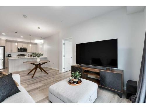 2209-220 Seton Grove Se, Calgary, AB - Indoor Photo Showing Living Room