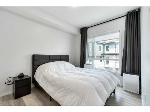 2209-220 Seton Grove Se, Calgary, AB - Indoor Photo Showing Bedroom