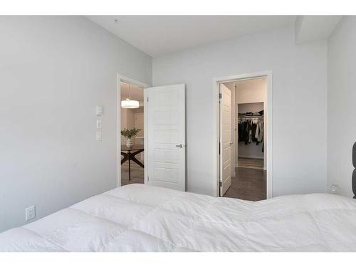 2209-220 Seton Grove Se, Calgary, AB - Indoor Photo Showing Bedroom