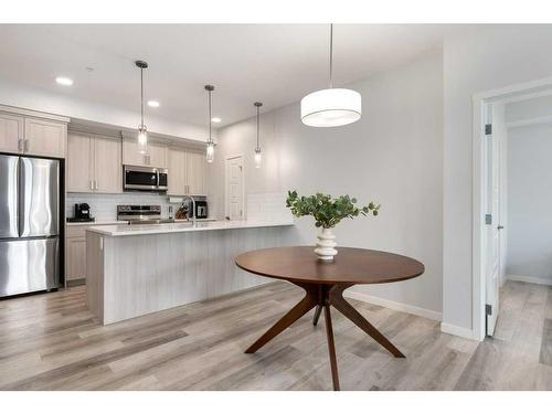 2209-220 Seton Grove Se, Calgary, AB - Indoor Photo Showing Kitchen With Upgraded Kitchen