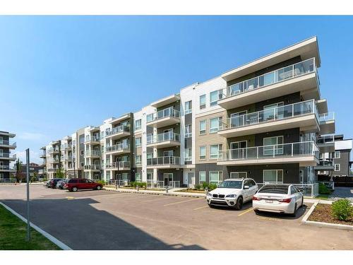 2209-220 Seton Grove Se, Calgary, AB - Outdoor With Balcony With Facade