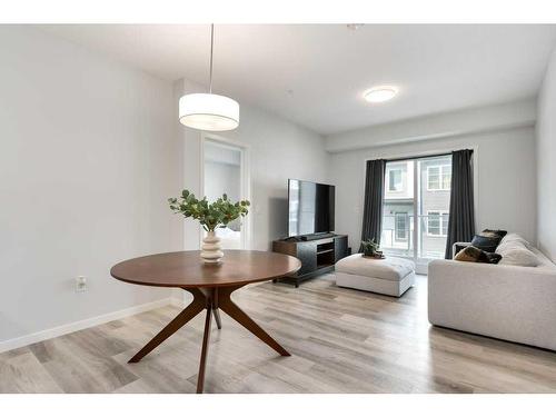 2209-220 Seton Grove Se, Calgary, AB - Indoor Photo Showing Living Room