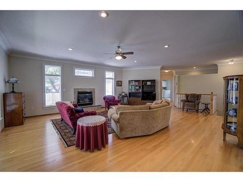 224 52 Avenue West, Claresholm, AB - Indoor Photo Showing Living Room With Fireplace