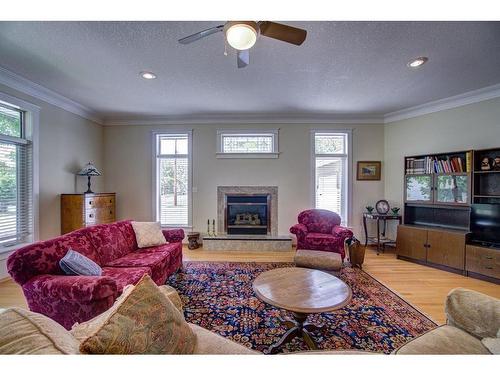 224 52 Avenue West, Claresholm, AB - Indoor Photo Showing Living Room With Fireplace