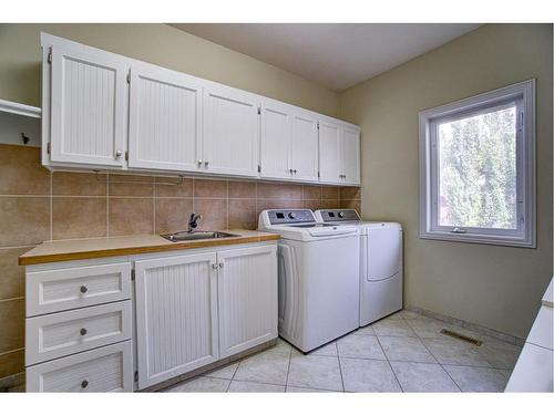 224 52 Avenue West, Claresholm, AB - Indoor Photo Showing Laundry Room