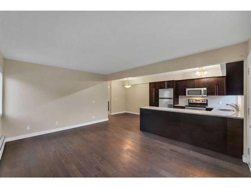 102-1508 23 Avenue Sw, Calgary, AB - Indoor Photo Showing Kitchen