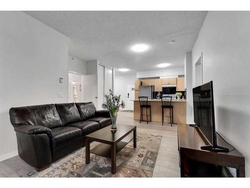 4307-73 Erin Woods Court Se, Calgary, AB - Indoor Photo Showing Living Room