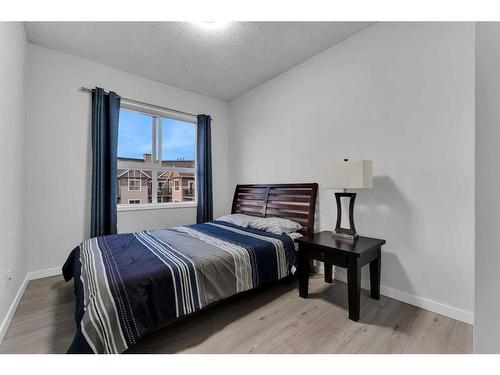 4307-73 Erin Woods Court Se, Calgary, AB - Indoor Photo Showing Bedroom