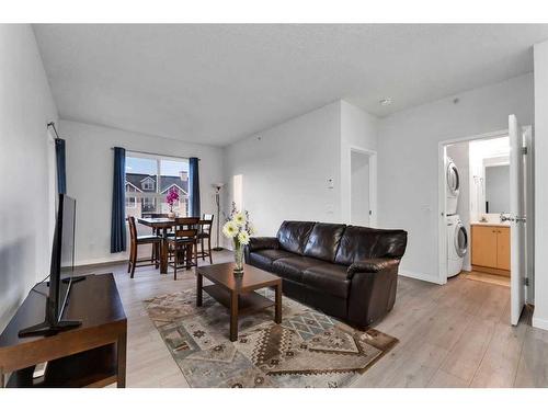 4307-73 Erin Woods Court Se, Calgary, AB - Indoor Photo Showing Living Room