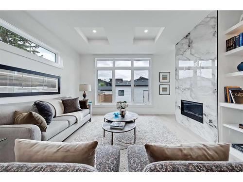 2009 23 Avenue Nw, Calgary, AB - Indoor Photo Showing Living Room With Fireplace