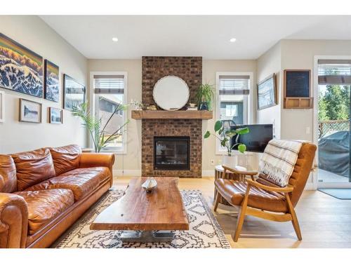 385 Evansborough Way Nw, Calgary, AB - Indoor Photo Showing Living Room With Fireplace