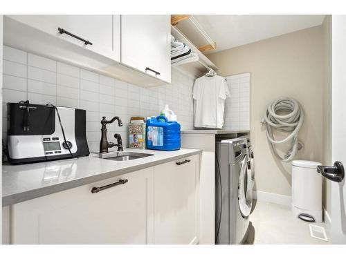 385 Evansborough Way Nw, Calgary, AB - Indoor Photo Showing Laundry Room