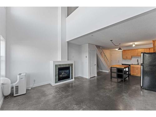 364-2233 34 Avenue Sw, Calgary, AB - Indoor Photo Showing Living Room With Fireplace