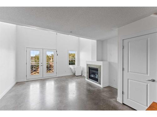 364-2233 34 Avenue Sw, Calgary, AB - Indoor Photo Showing Living Room With Fireplace