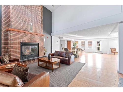 364-2233 34 Avenue Sw, Calgary, AB - Indoor Photo Showing Living Room With Fireplace