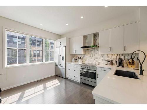 108 Ascot Point Sw, Calgary, AB - Indoor Photo Showing Kitchen With Upgraded Kitchen