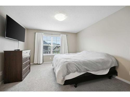 187 Cranford Crescent Se, Calgary, AB - Indoor Photo Showing Bedroom