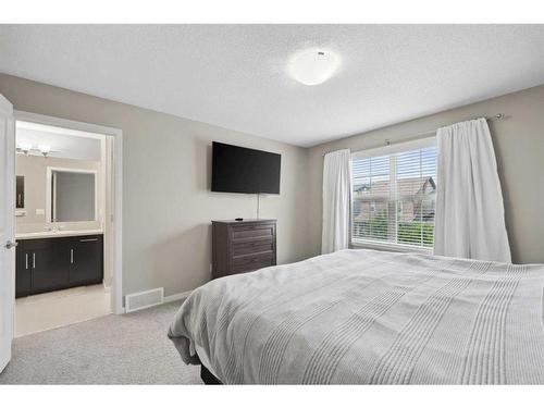 187 Cranford Crescent Se, Calgary, AB - Indoor Photo Showing Bedroom