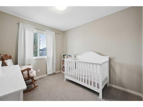 187 Cranford Crescent Se, Calgary, AB - Indoor Photo Showing Bedroom