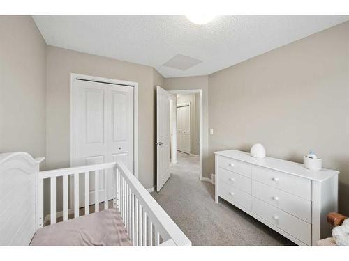 187 Cranford Crescent Se, Calgary, AB - Indoor Photo Showing Bedroom