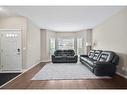 187 Cranford Crescent Se, Calgary, AB  - Indoor Photo Showing Living Room 