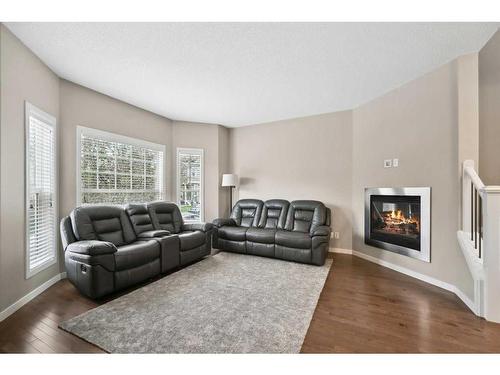 187 Cranford Crescent Se, Calgary, AB - Indoor Photo Showing Living Room With Fireplace