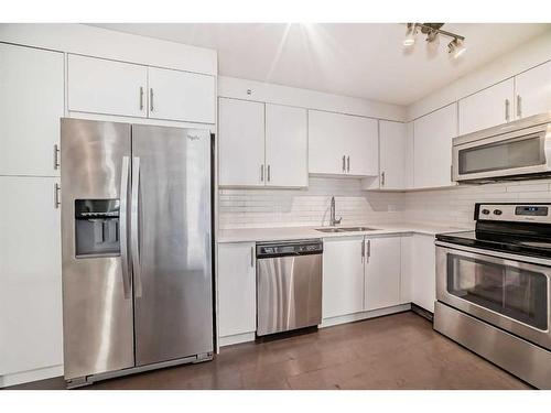 1406-302 Skyview Ranch Drive Ne, Calgary, AB - Indoor Photo Showing Kitchen With Stainless Steel Kitchen With Double Sink With Upgraded Kitchen