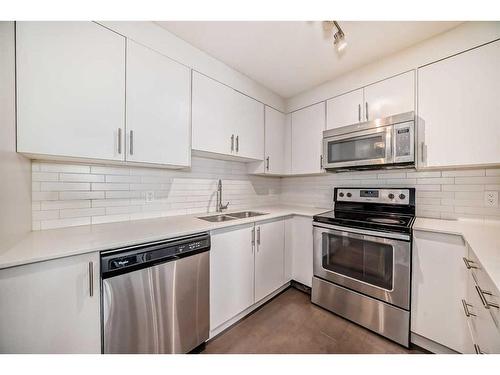 1406-302 Skyview Ranch Drive Ne, Calgary, AB - Indoor Photo Showing Kitchen With Stainless Steel Kitchen With Double Sink