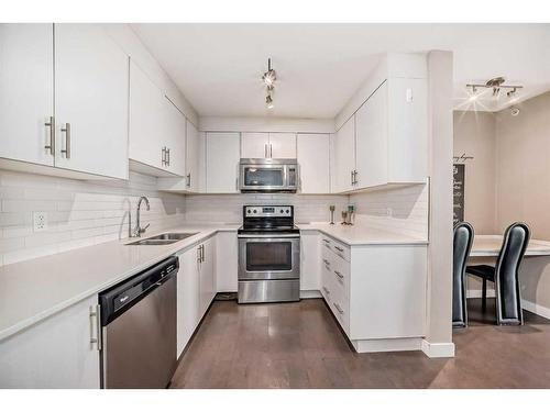 1406-302 Skyview Ranch Drive Ne, Calgary, AB - Indoor Photo Showing Kitchen With Stainless Steel Kitchen With Double Sink