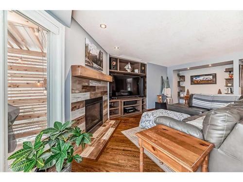 92 Douglas Woods Grove Se, Calgary, AB - Indoor Photo Showing Living Room With Fireplace