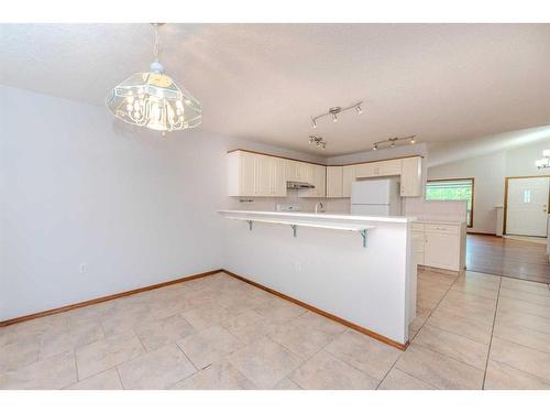 64 Chaparral Way Se, Calgary, AB - Indoor Photo Showing Kitchen