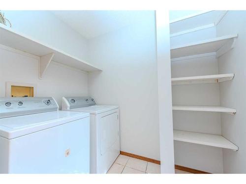 64 Chaparral Way Se, Calgary, AB - Indoor Photo Showing Laundry Room