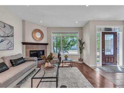 2416 1 Avenue Nw, Calgary, AB - Indoor Photo Showing Living Room With Fireplace