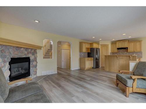 244 Cranfield Park Se, Calgary, AB - Indoor Photo Showing Living Room With Fireplace