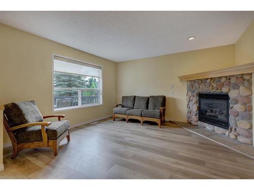 244 Cranfield Park Se, Calgary, AB - Indoor Photo Showing Living Room With Fireplace