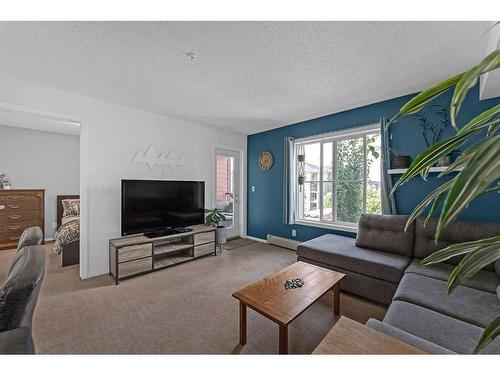 3307-81 Legacy Boulevard Se, Calgary, AB - Indoor Photo Showing Living Room