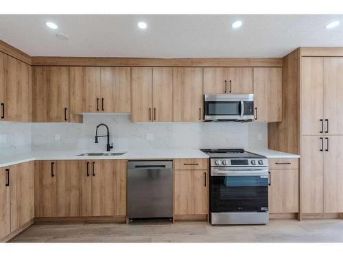 68 Hawkville Place Nw, Calgary, AB - Indoor Photo Showing Kitchen With Double Sink