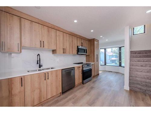 68 Hawkville Place Nw, Calgary, AB - Indoor Photo Showing Kitchen With Double Sink