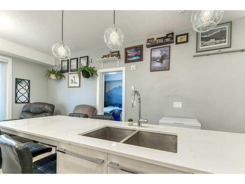 1124-76 Cornerstone Passage Ne, Calgary, AB - Indoor Photo Showing Kitchen With Double Sink