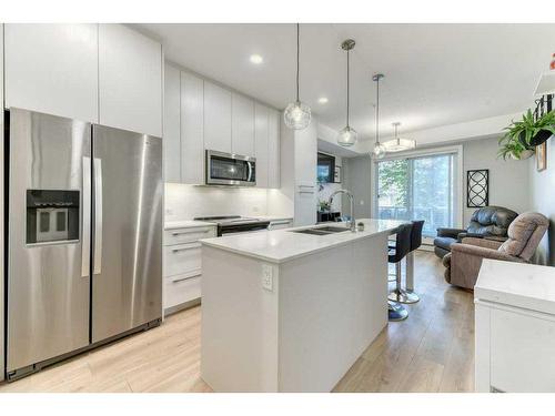 1124-76 Cornerstone Passage Ne, Calgary, AB - Indoor Photo Showing Kitchen With Stainless Steel Kitchen With Double Sink With Upgraded Kitchen